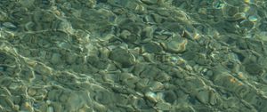 Preview wallpaper stones, pebbles, water, underwater, glare, minimalism