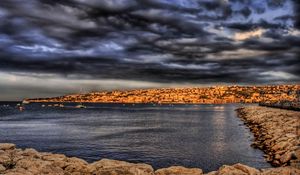 Preview wallpaper stones, pier, sea, clouds, sky