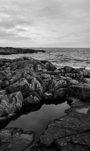 Preview wallpaper stones, reefs, sea, water, horizon, black and white