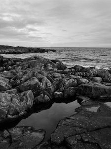 Preview wallpaper stones, reefs, sea, water, horizon, black and white