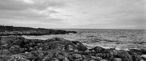 Preview wallpaper stones, reefs, sea, water, horizon, black and white