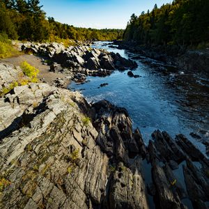 Preview wallpaper stones, relief, river, forest, trees