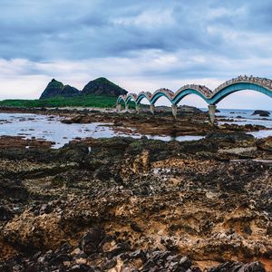 Preview wallpaper stones, river, bridge, rocks