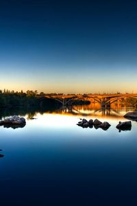 Preview wallpaper stones, river, bridge, morning, water smooth surface, dawn