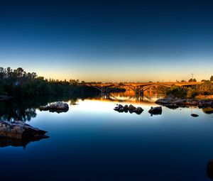 Preview wallpaper stones, river, bridge, morning, water smooth surface, dawn