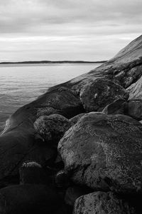 Preview wallpaper stones, rock, sea, black and white, landscape