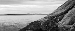 Preview wallpaper stones, rock, sea, black and white, landscape