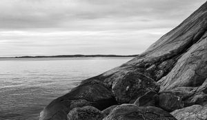 Preview wallpaper stones, rock, sea, black and white, landscape