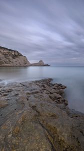 Preview wallpaper stones, rock, sea, landscape, clouds
