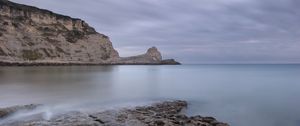 Preview wallpaper stones, rock, sea, landscape, clouds