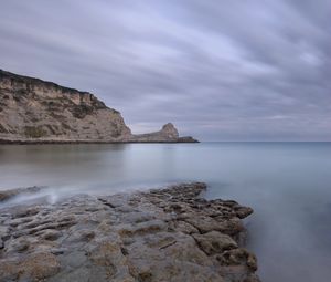 Preview wallpaper stones, rock, sea, landscape, clouds