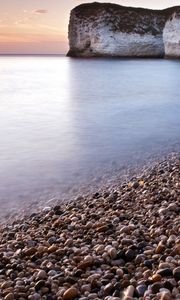 Preview wallpaper stones, rock, sea, smooth surface, coast