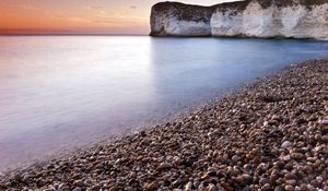 Preview wallpaper stones, rock, sea, smooth surface, coast