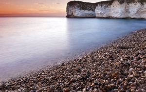 Preview wallpaper stones, rock, sea, smooth surface, coast
