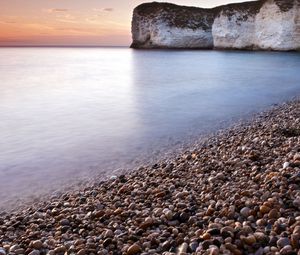 Preview wallpaper stones, rock, sea, smooth surface, coast