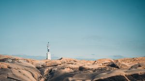 Preview wallpaper stones, rocks, coast, building, sky