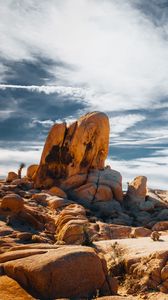 Preview wallpaper stones, rocks, field, clouds, sky, nature