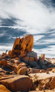Preview wallpaper stones, rocks, field, clouds, sky, nature