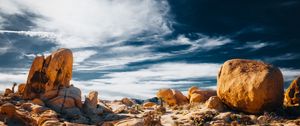 Preview wallpaper stones, rocks, field, clouds, sky, nature