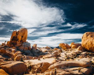 Preview wallpaper stones, rocks, field, clouds, sky, nature