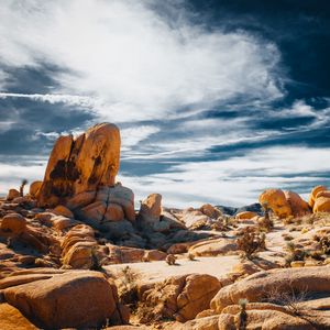 Preview wallpaper stones, rocks, field, clouds, sky, nature
