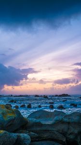 Preview wallpaper stones, rocks, sea, sunset, clouds