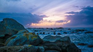 Preview wallpaper stones, rocks, sea, sunset, clouds