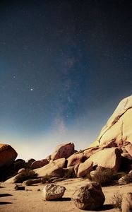 Preview wallpaper stones, rocks, starry sky, stars, night, nebula