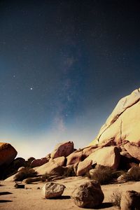 Preview wallpaper stones, rocks, starry sky, stars, night, nebula