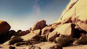 Preview wallpaper stones, rocks, starry sky, stars, night, nebula