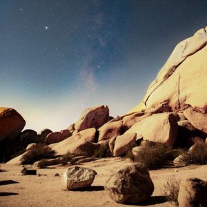 Preview wallpaper stones, rocks, starry sky, stars, night, nebula