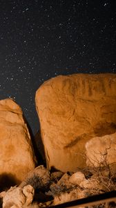 Preview wallpaper stones, rocks, stars, starry sky, night