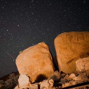 Preview wallpaper stones, rocks, stars, starry sky, night