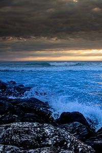 Preview wallpaper stones, rocks, surf, spray, sea