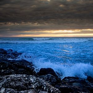 Preview wallpaper stones, rocks, surf, spray, sea