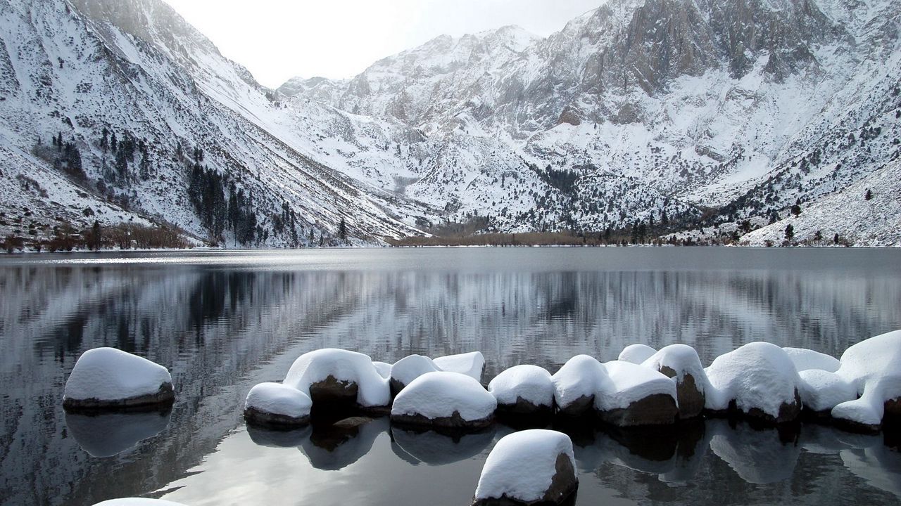 Wallpaper stones, row, snow, mountains, lake, distance hd, picture, image