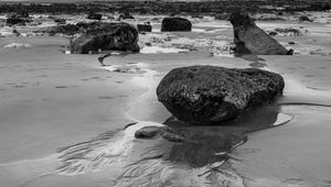 Preview wallpaper stones, sand, sea, bw