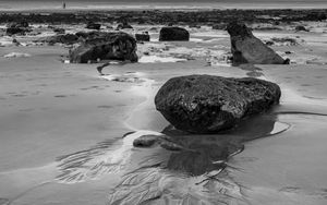 Preview wallpaper stones, sand, sea, bw