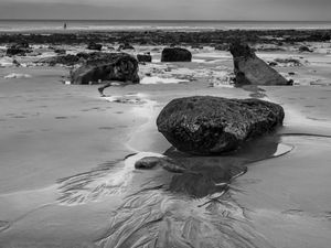 Preview wallpaper stones, sand, sea, bw