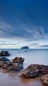 Preview wallpaper stones, sand, sea, beams, sky