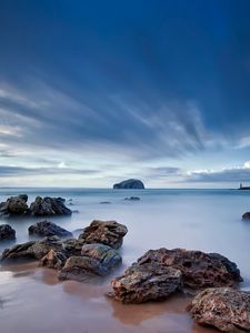 Preview wallpaper stones, sand, sea, beams, sky