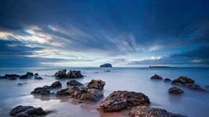 Preview wallpaper stones, sand, sea, beams, sky