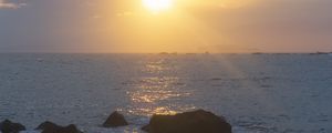 Preview wallpaper stones, sea, glare, sunset