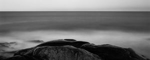 Preview wallpaper stones, sea, horizon, black and white, nature