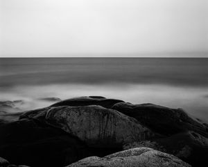 Preview wallpaper stones, sea, horizon, black and white, nature