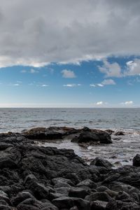 Preview wallpaper stones, sea, horizon, landscape, nature, sky