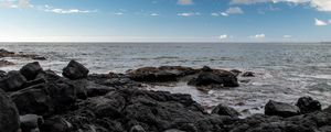 Preview wallpaper stones, sea, horizon, landscape, nature, sky