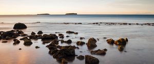 Preview wallpaper stones, sea, horizon, sky, clouds