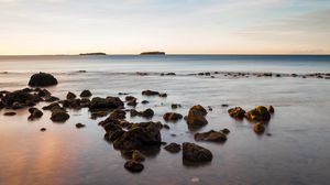 Preview wallpaper stones, sea, horizon, sky, clouds