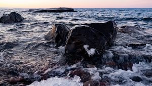 Preview wallpaper stones, sea, horizon, ice, coast